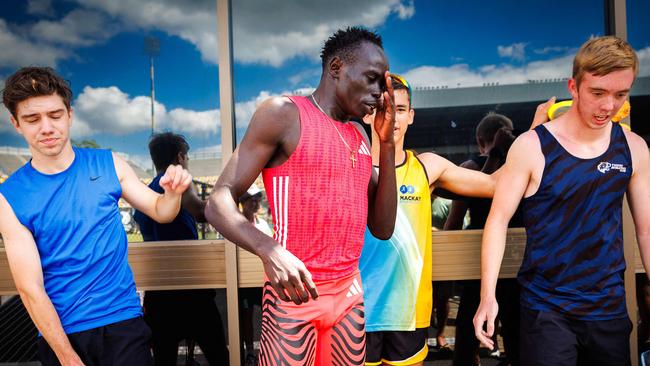 Australia's Gout Gout (C) reacts after competing in the men's 200m.