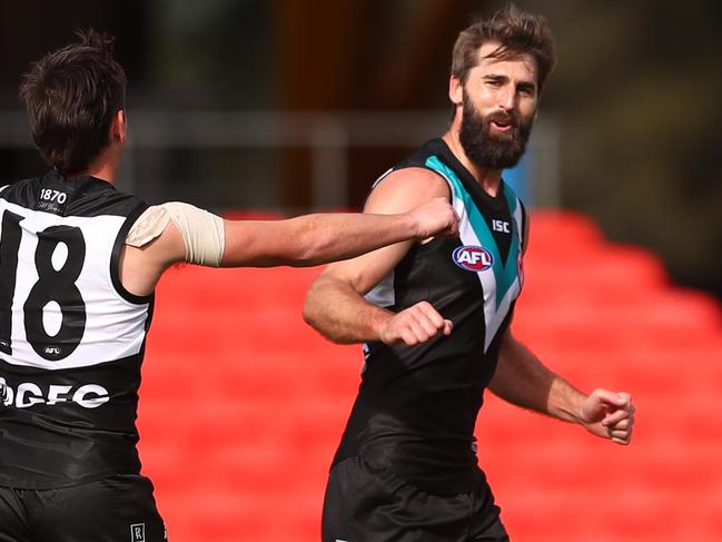 GOLD COAST, AUSTRALIA - JUNE 27: Justin Westhoff of the Power celebrates a goal during the round 4 AFL match between the Port Adelaide Power and the West Coast Eagles at Metricon Stadium on June 27, 2020 in Gold Coast, Australia. (Photo by Chris Hyde/Getty Images)