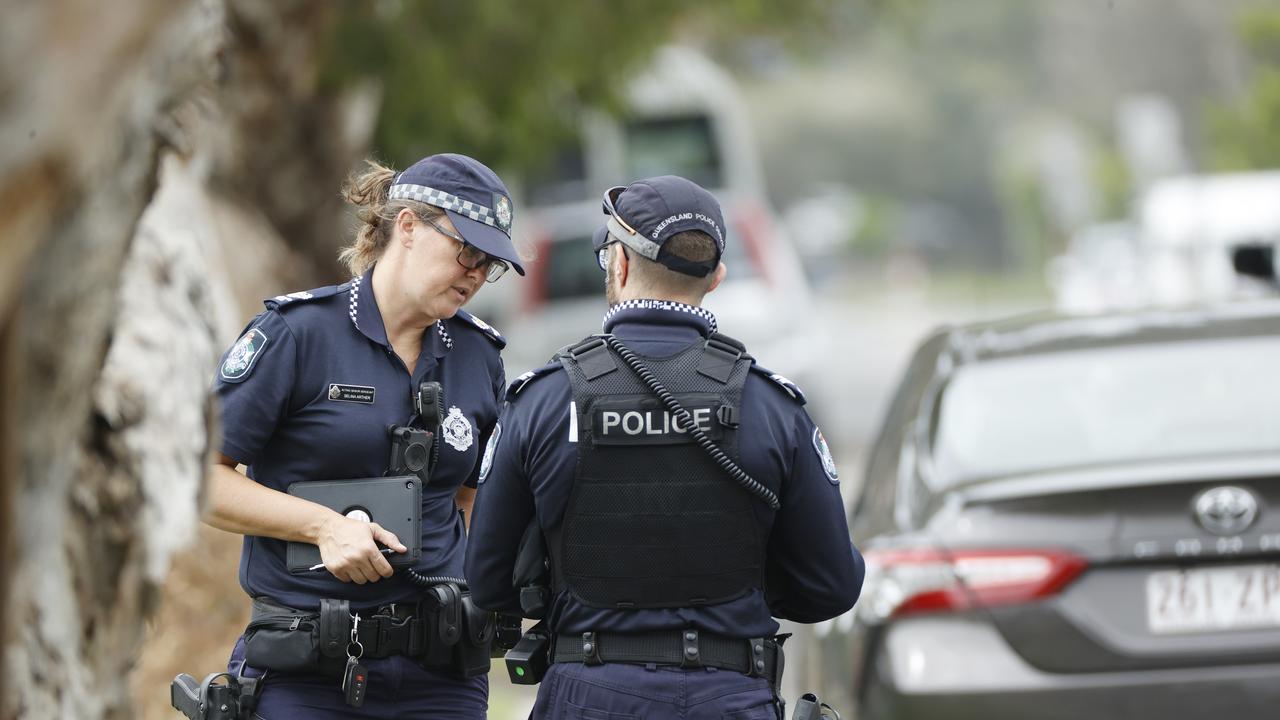 Police at the scene of a fatal stabbing at Iluka Ave at Buddina on Friday morning. Picture: Lachie Millard