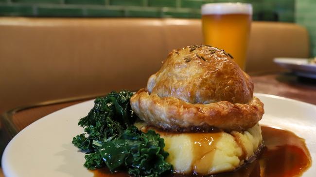 A meat pie with potato mash. Picture: Jenifer Jagielski