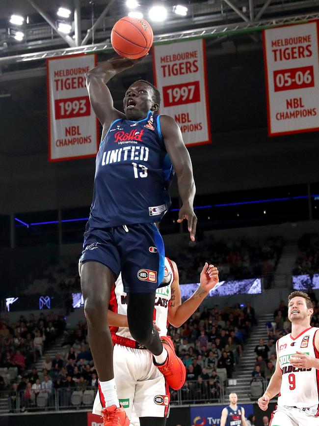 Makuach Maluach takes to the skies in Melbourne United’s commanding win. Picture: Kelly Defina/Getty Images