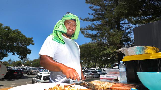 A large group from Brisbane has been camping at the Tallebudgera Creek Park. Group spokesman Jeremy (no last name given) cooks lunch for the group. Picture Glenn Hampson