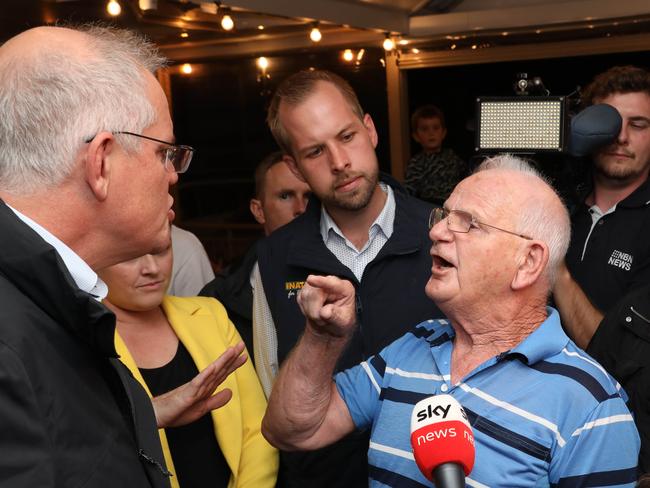 Furious pensioner clashes with ScoMo at NSW pub