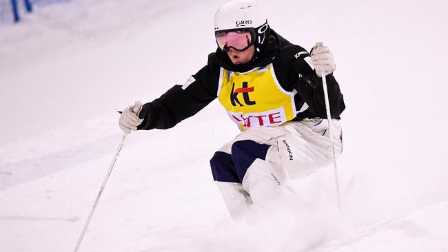 Britteny Cox wins the women’s final of the World Cup moguls on the Olympic course at Phoenix Park, PyeongChang.