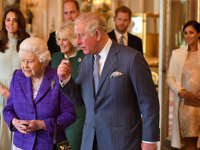 The Queen and Prince Charles, front, with Kate, Wills, Harry and Meghan. Picture: AFP