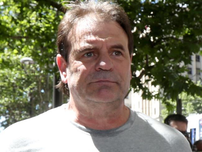 CFMEU Victorian secretary John Setka participate in a Construction, Forestry, Maritime, Mining and Energy Union (CFMEU) rally in Adelaide, Wednesday, October 23, 2019. Hundreds of workers have stopped work at building sites across the city to demand the introduction of industrial manslaughter laws. (AAP Image/Kelly Barnes) NO ARCHIVING