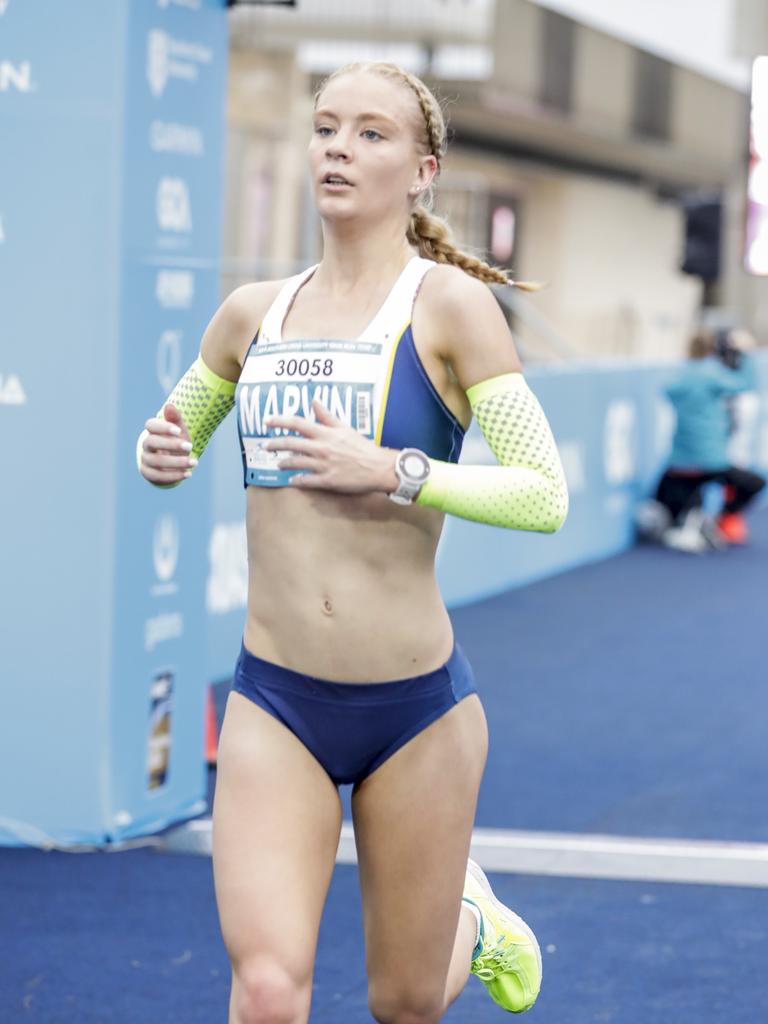 Sarah Marvin crosses the finish line of the Southern Cross University ten kilometre Run. Picture: Tim Marsden.