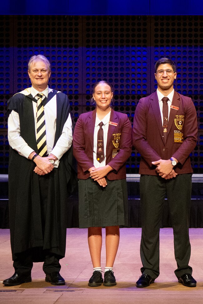 St Peters Lutheran College head of college Tim Kotzur with captains Meg Hofstee and Jacob Deeb. Photo – contributed.