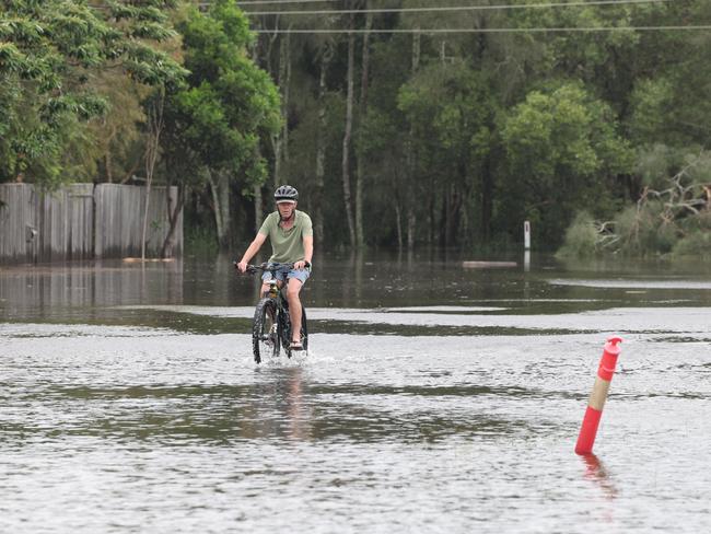 Water across Ewingsdale Road, the main road into Byron Bay. Picture: Rohan Kelly