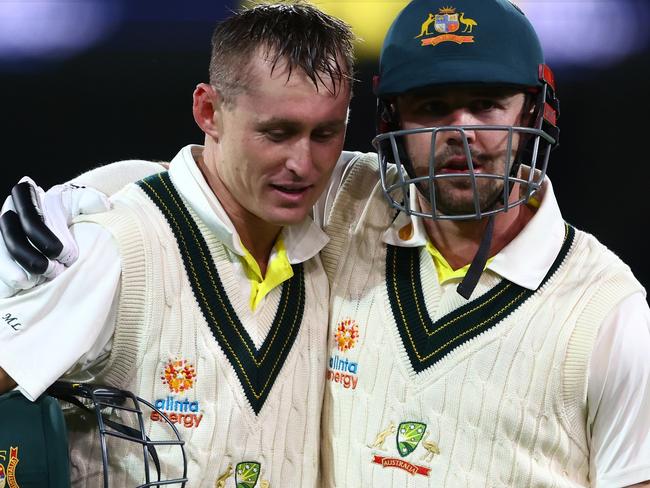 ADELAIDE, AUSTRALIA - DECEMBER 08: Marnus Labuschagne and Travis Head of Australia walk from the field at the end of play during day one of the Second Test Match in the series between Australia and the West Indies at Adelaide Oval on December 08, 2022 in Adelaide, Australia. (Photo by Chris Hyde/Getty Images)