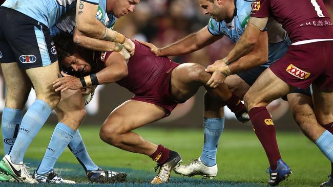 Dane Gagai takes on the Blues defence.