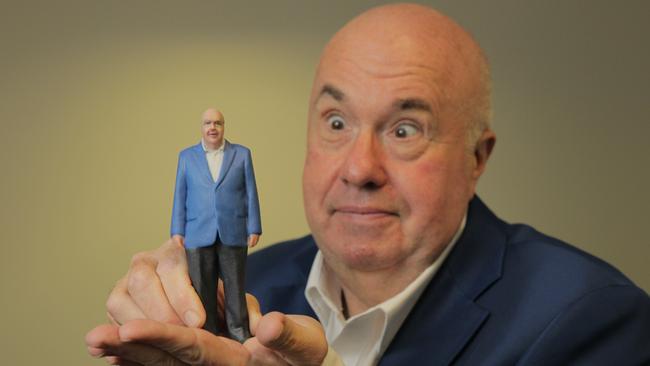 Chris Griffith with his Mini Me made with a 3-D printer. Picture: Hollie Adams