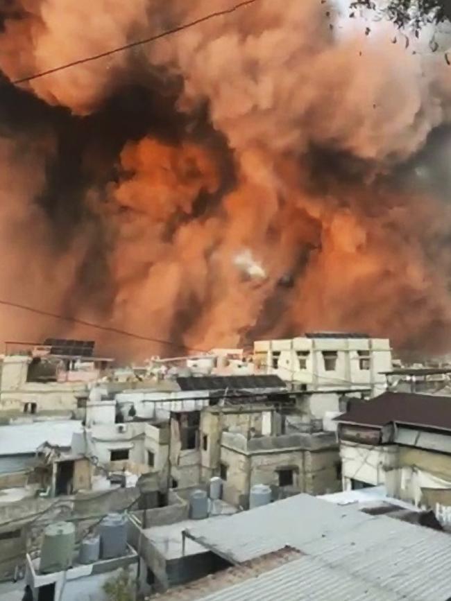 Smoke rises above buildings in Beirut.