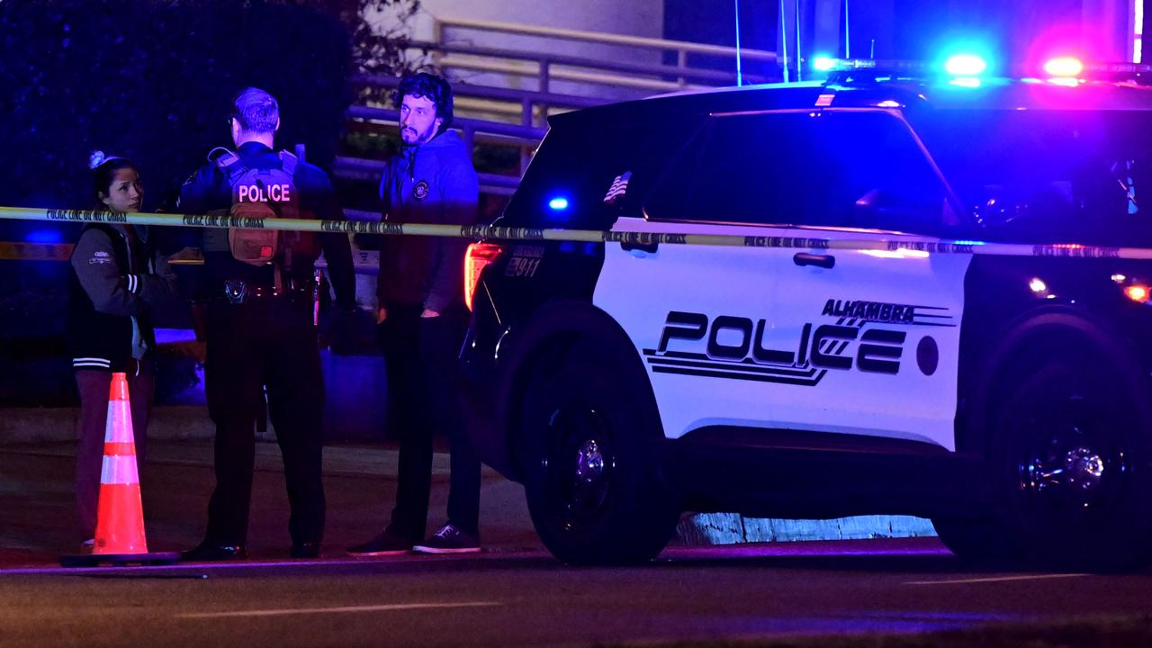 Police patrol the scene along Garvey Avenue in Monterey Park, California, after reports of multiple people shot. Picture: Frederic J. Brown/AFP