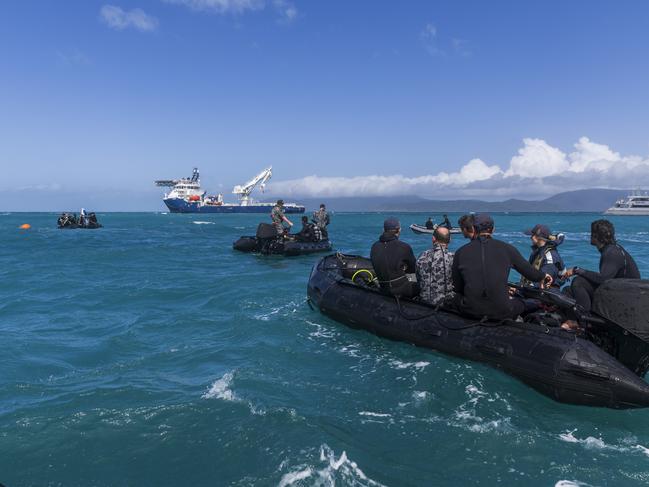Royal Australian Navy Clearance Divers and Queensland Police Service during the recovery.