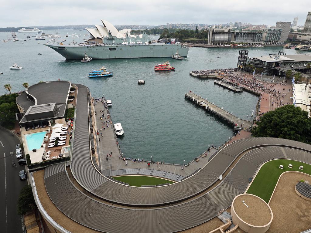 Pictured is a Australian naval ship in front of the Opera House ahead of the annual Sydney Ferry Race on Sydney Harbour on Australia Day 2017. Picture: Richard Dobson