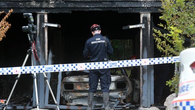 Police investigating the house fire. Picture: AAP/Sarah Marshall