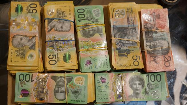 Just a small amount of the millions of dollars in cash seized by NSW Police State Crime Command from Asian gangs through recent Strike Forces. Picture: NSW Police