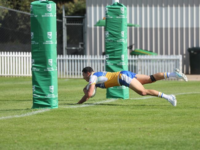 . Phoenix Tauasa for Patrician Brothers breaks away to score a try. Picture: Tim Hunter.