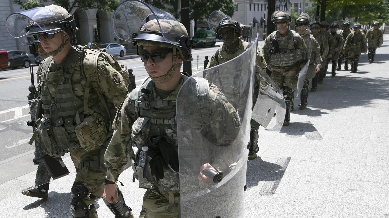 A military unit tasked with crowd control moving up 15th Street in Washington D.C. this week. Picture: Win McNamee/Getty Images/AFP