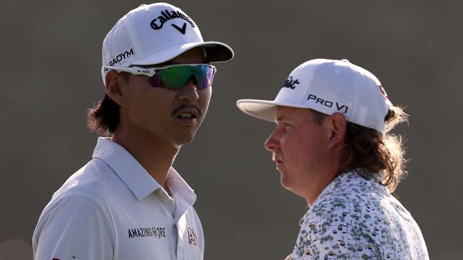 Min Woo Lee and Cameron Smith at the Australian Open. Picture: AFP Images