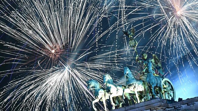 Fireworks illuminate the Quadriga atop the Brandenburg Gate. Picture: AFP