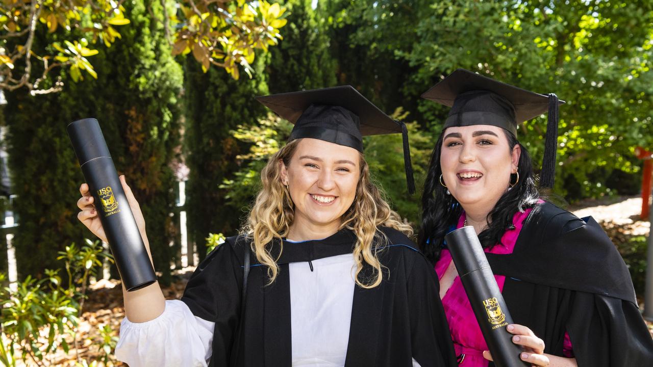 Bachelor of Nursing graduates Eve Campbell (left) and Claudia Austin at the UniSQ graduation ceremony at Empire Theatres, Wednesday, December 14, 2022.