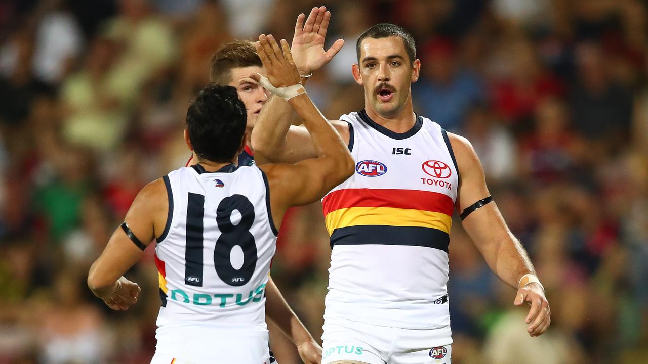 Eddie Betts and former teammate Taylor Walker. Picture: Getty Images