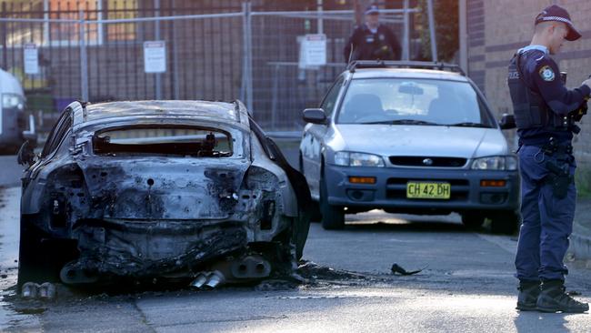 A burnt out car on Norwood Lane in Marrickville. Picture: NCA NewsWire / Damian Shaw