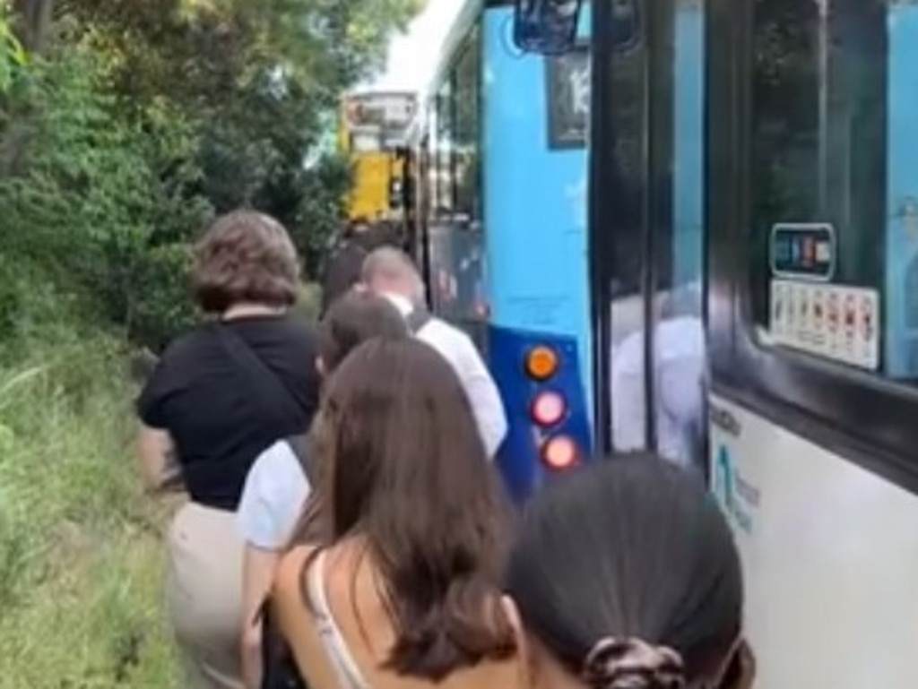 Bus passengers were forced to disembark and weave through standstill traffic. Picture: Supplied