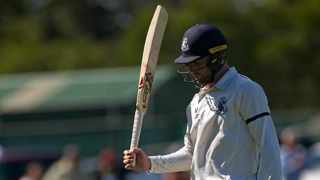 Mackenzie Harvey walks off saluting his century. Pictures: CM THOMAS PHOTOGRAPHY