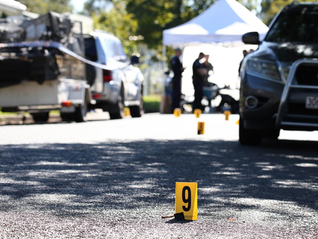 Police investigate at the scene. Picture: David Clark