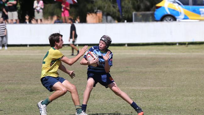Action galleries of the junior rugby union grand finals, match played at Surfers Paradise Home Ground. Helensvale Hogs Vs Surfers Paradise Dolphins under 13s division. Picture Mike Batterham