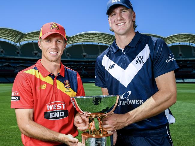 ADELAIDE, AUSTRALIA - FEBRUARY 28:Nathan McSweeney captain of South Australia  and Will Sutherland captain of Victoria   with the Dean Jones Trophy during the One Day Cup Final captain's call at Adelaide Oval on February 28, 2025 in Adelaide, Australia. (Photo by Mark Brake/Getty Images)