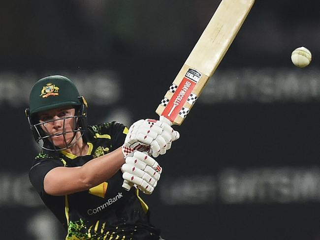 Australia's Tahlia McGrath plays a shot during the first womenâs Twenty20 international cricket match between India and Australia at the DY Patil stadium in Navi Mumbai on December 9, 2022. (Photo by Punit PARANJPE / AFP) / ----IMAGE RESTRICTED TO EDITORIAL USE - STRICTLY NO COMMERCIAL USE-----