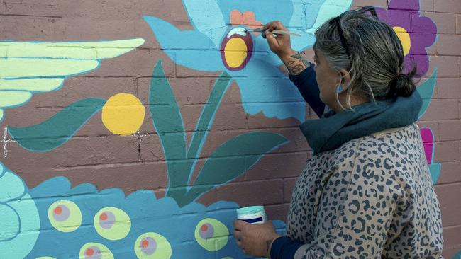 Joanna Kambourian painting her Armenian tile Peacock work in the Back Alley Gallery Refresh Project in June 2021. Picture: Cath Piltz