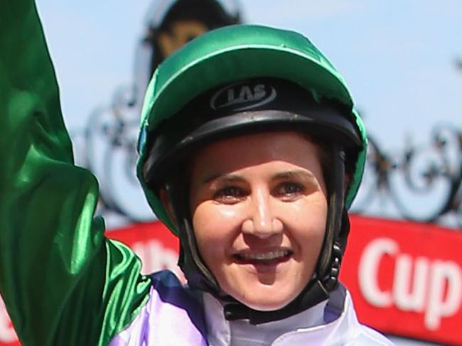 MELBOURNE, AUSTRALIA - NOVEMBER 03: Michelle Payne riding Prince Of Penzance returns to scale after winning race 7 the Emirates Melbourne Cup on Melbourne Cup Day at Flemington Racecourse on November 3, 2015 in Melbourne, Australia. (Photo by Michael Dodge/Getty Images)