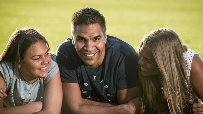 Former AFL football player Andrew Krakouer with daughters Allira (left) and Tekia. PICTURE : MATTHEW POON.