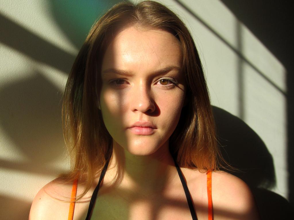 Trinity Burton from Terrigal (NSW) Terrigal High School Shadows “Lovely use of light and shadows. The simplicity of the portrait pulls you in and connects you with the subject. What is she thinking? It doesn’t give you all the answers which in itself creates connection between you and the subject.” Picture: 2015 Canon Light Awards