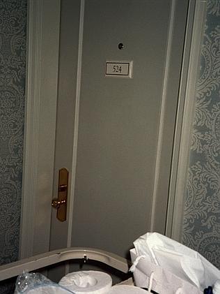 Hutchence was found naked behind the door to his room, 524.  