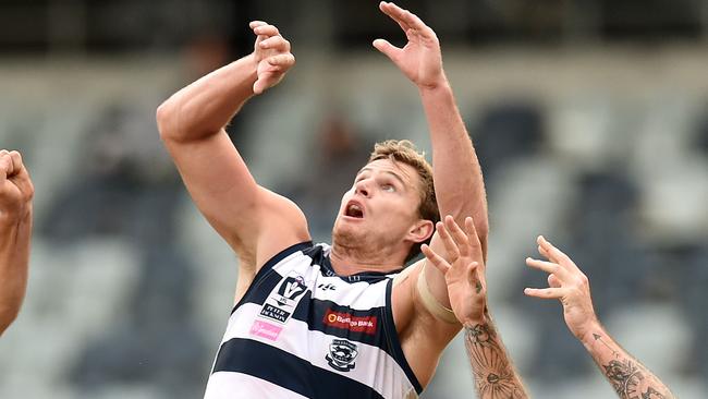 Nathan Vardy shows off his marking ability. Picture: NIGEL HALLETT