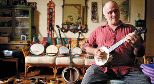 North Lismore man Daniel Paitson’s search for the perfect banjo has resulted in an impressive and varied collection. . Picture: Cathy Adams