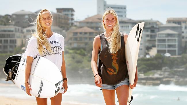 (L-R) Isabella Nichols,18, & Macey Callaghan, 15, pose during a photo shoot on Manly Beach. The young surfers are showing huge potential & look to have a big future in the sport. Isabella is from Coolum on the Sunshine Coast of QLD & Macey is from Avoca Beach on the NSW Central Coast Picture: Troy Snook