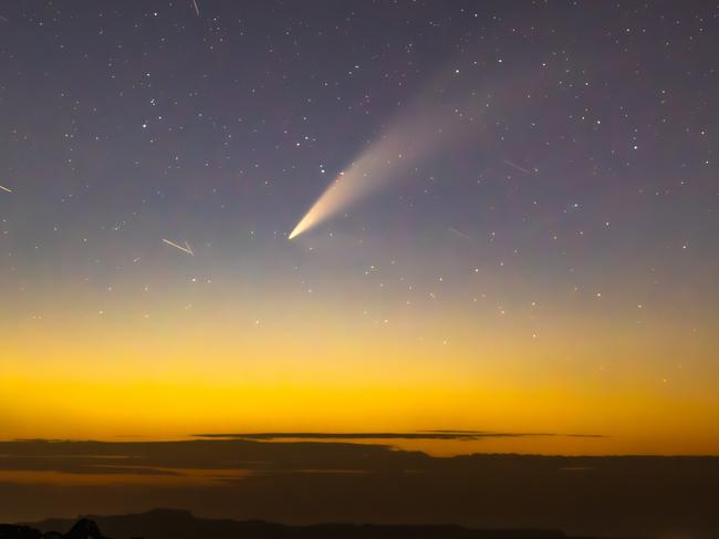 The Atlas comet photographed from the summit of kunanyi/Mt Wellington. Picture: Scott Glynn