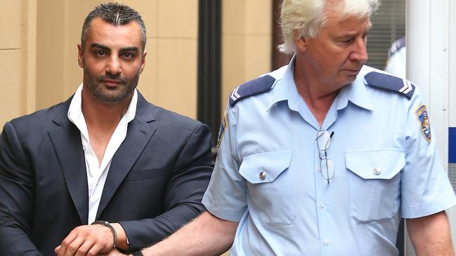 Mick Hawi in custody for his role in the Sydney Airport bikie brawl in 2009. Picture: Bradley Hunter