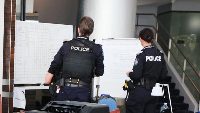 Police inside one of the Gold Coast Quarantine Hotels. Photo: Scott Powick Newscorp