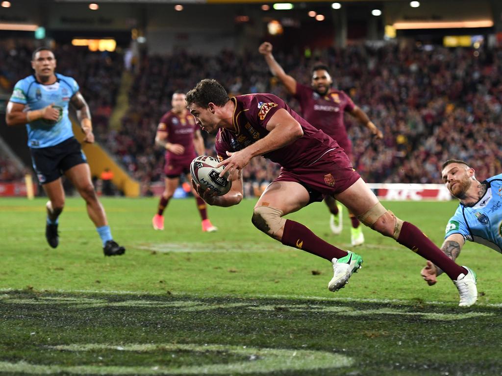 Oates crosses the line to score a try for the Queensland Maroons in 2017. (Picture: AAP Image/Dan Peled