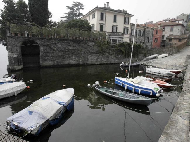 <p>Lake Como's picturesque setting has made it a popular destination for the rich and famous. Other high profile residents include Richard Branson, Donatella Versace and Jose Mourinho, the manager of Inter Milan. Picture: Reuters</p>