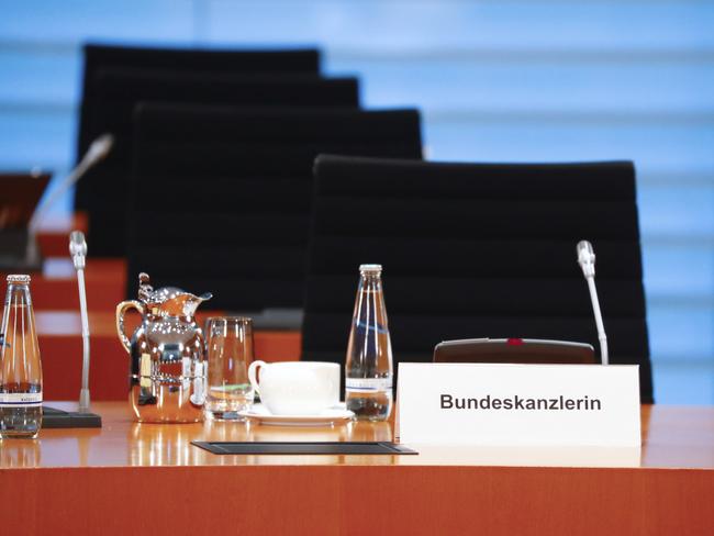 The chair of German Chancellor Angela Merkel is empty prior to the weekly cabinet meting at the chancellery in Berlin as she self-quarantined amid coronavirus concerns. Picture: AP