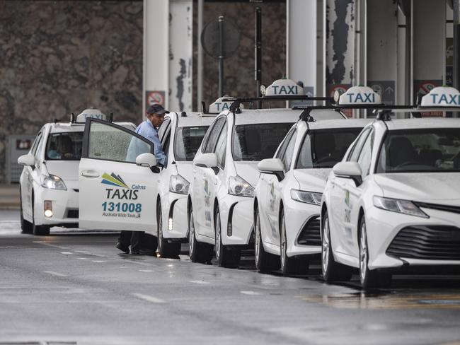 Covid Lockdown -Taxi line up for potential but non existenet passenger at Cairns Domestic Aiport. One of their number is the driver that tested positive for the virus. Picture : Brian Cassey